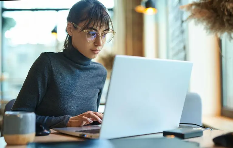 woman using laptop indoors