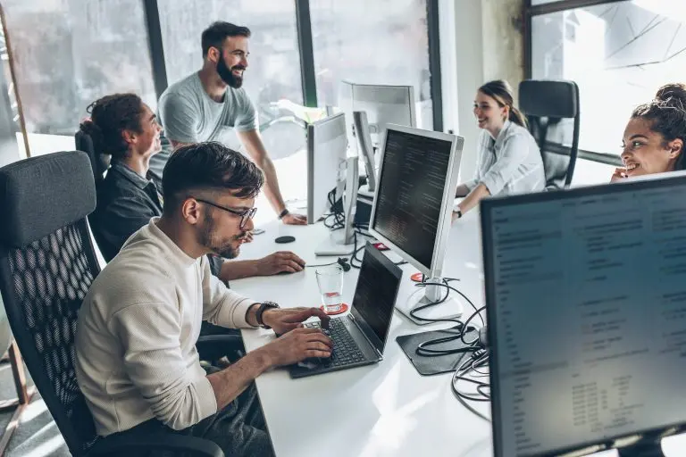team working at computers