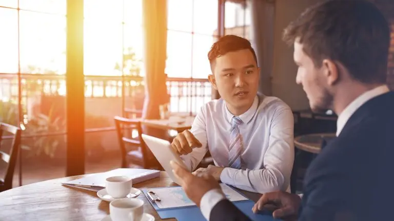 two men discussing business