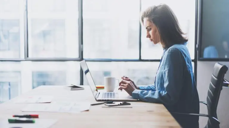 woman working on laptop