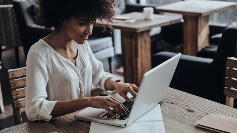 woman using laptop indoors