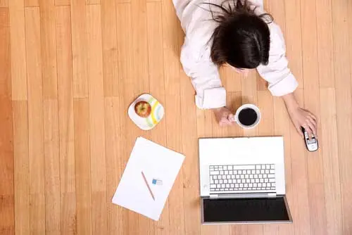 laptop coffee woman floor