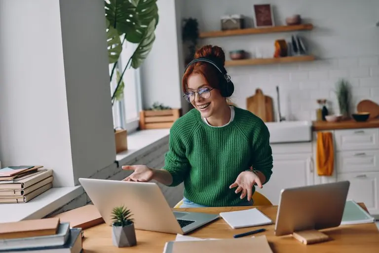 woman smiling wearing headphones