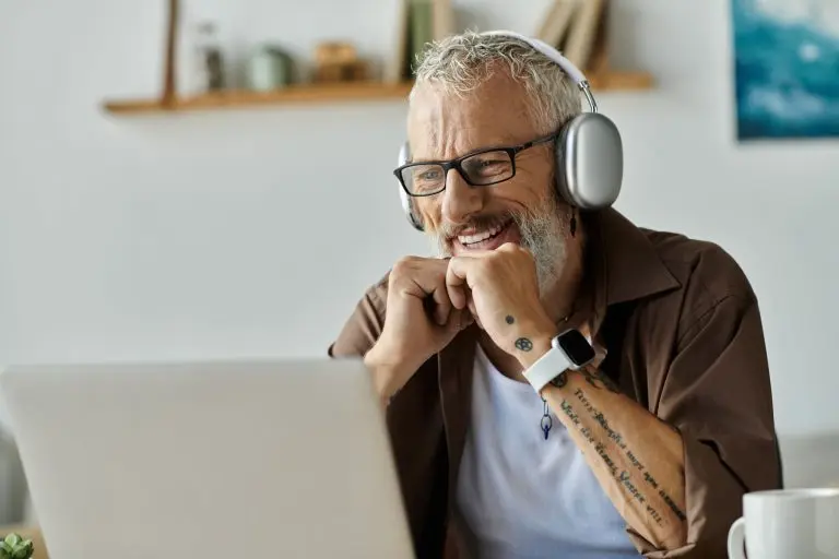 man with headphones smiling