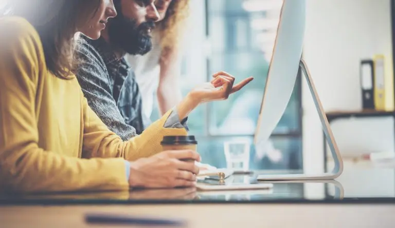 people collaborating at computer